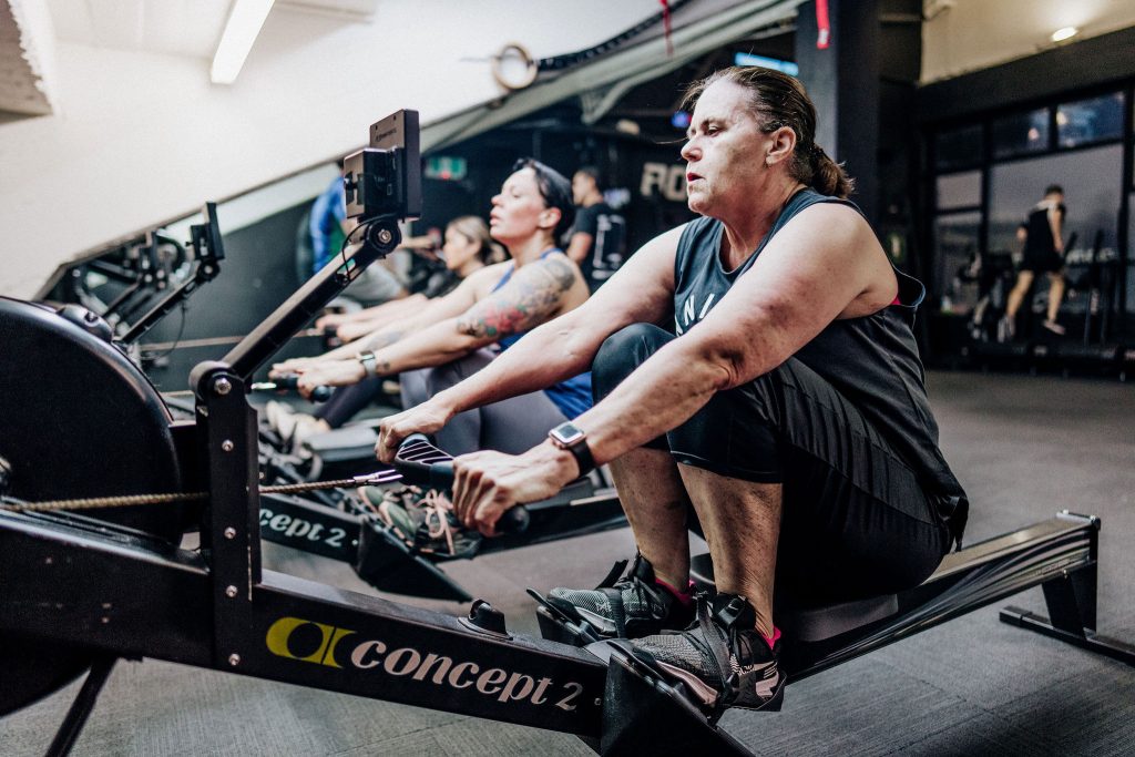 Women rowing on Concept2 machines during a group training session at Body Torque Gym in Newmarket, Auckland.